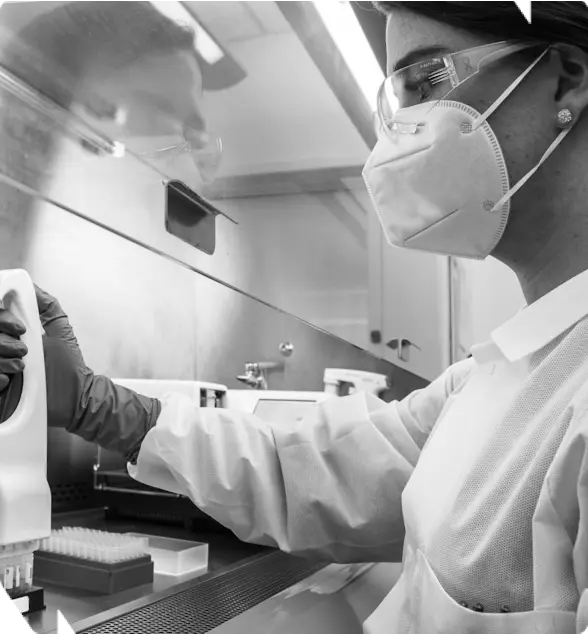 Scientist working in protective gear